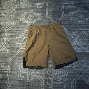 small brown Nike shorts